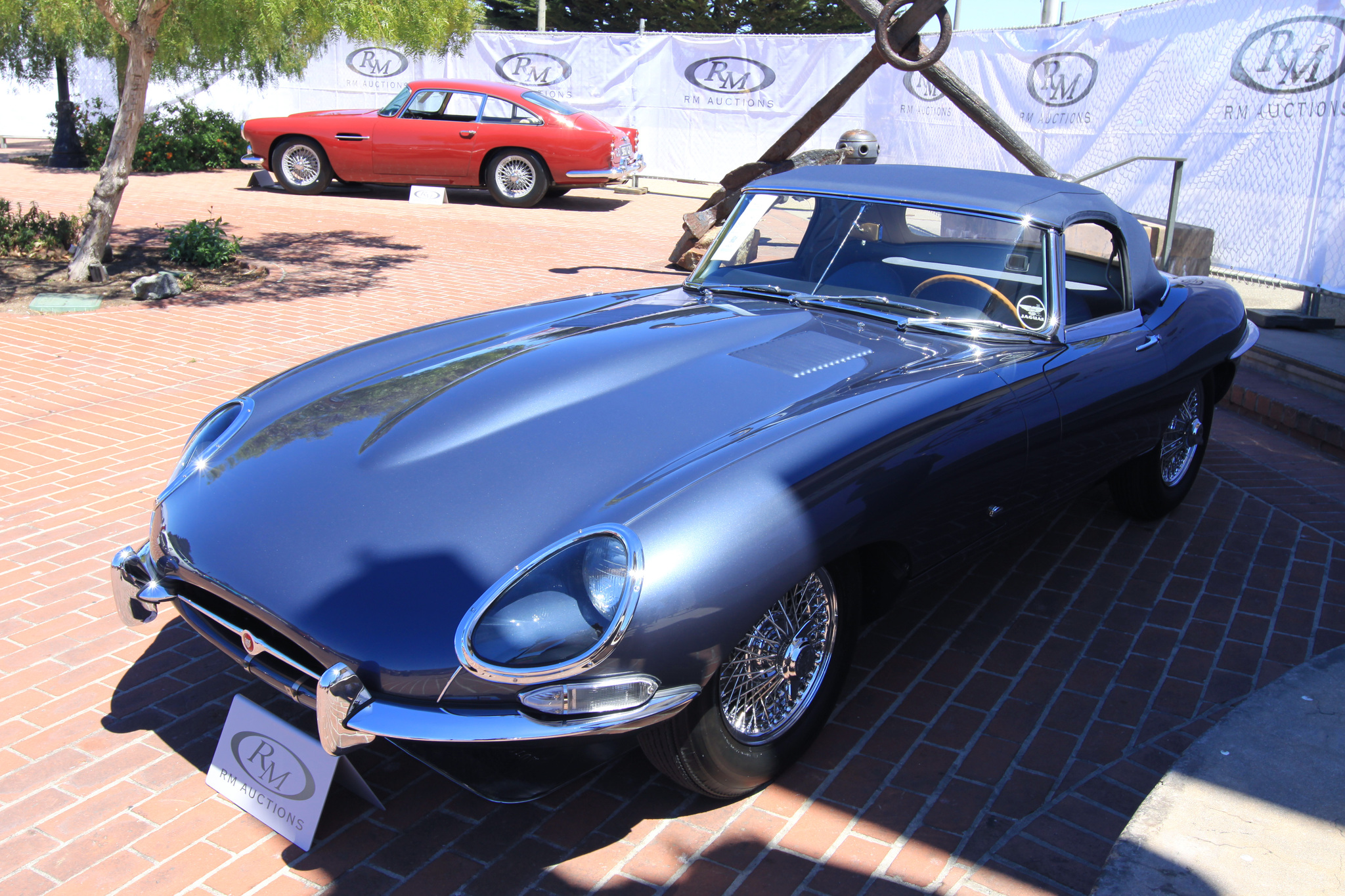 1961 Jaguar E-Type 3.8-Litre Roadster 875331 - sold for $440,000 at RM Auctions. Early outside-bonnet latch, flat-floor, welded-louver Series 1. Received 100 points at the 2014 JCNA Concours and a First in Class at the 2014 San Marino Classic Concours. Tremendous preservation of its original sheet metal and mechanicals. Documented as matching-numbers engine and transmission by JDHT.